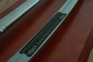 Inskrypcja na pamiątkowej szabli