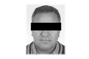 zdjęcie poszukiwanego z czarnym paskiem na oczach