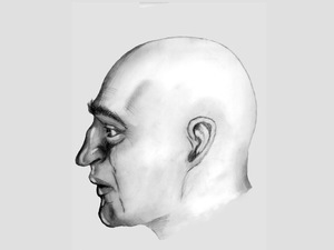 rysunek mężczyzny na szarej kartce. Lewy profil
