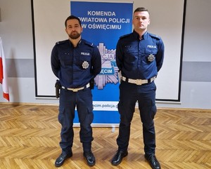 Policjanci Czajkowski i Pająk na tle rollap