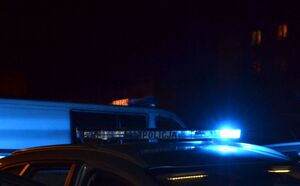 radiowóz na sygnałach w tle blok