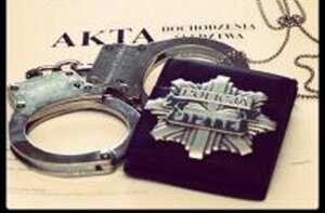 kajdanki, policyjna gwiazda, obwoluta akt